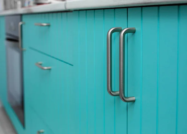 Blue wooden facade of kitchen cabinets made of thin strips with chrome handles. — Stock Image Blue Wooden Facade Kitchen Cabinets Made Thin Strips Chrome Handles Stock Photo