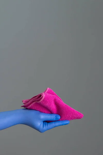 Hand Rubber Glove Holds Bright Microfiber Duster Neutral Background Concept — Stock Photo, Image
