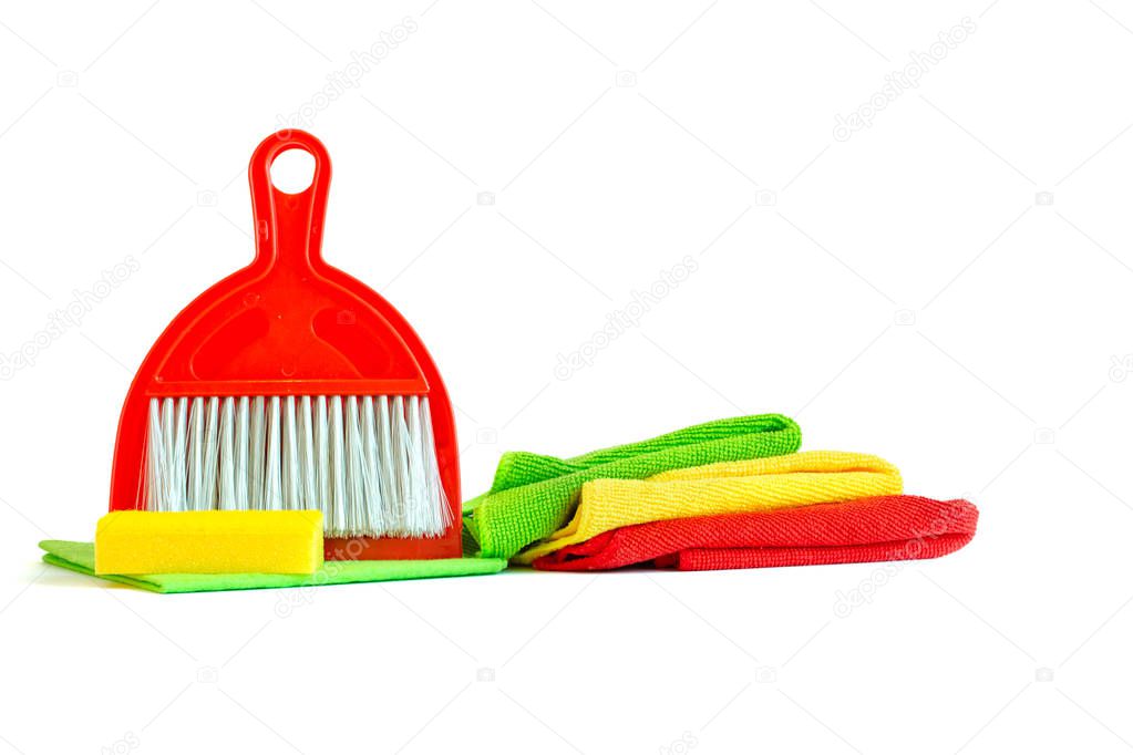 A set of tools for cleaning the house-duster, microfiber towels, scoop and panicle. Isolated on white background. Copy space.