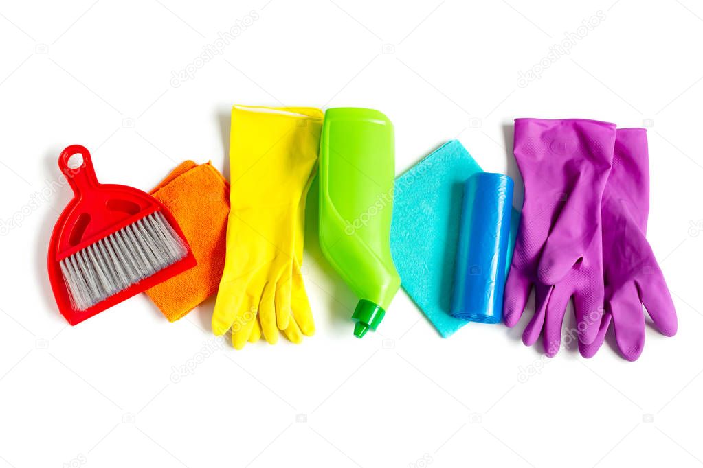 Cleaning products set of rainbow colors isolated on white background. Spring cleaning concept. Top view