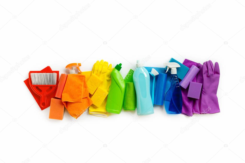 Cleaning products and tools  set of rainbow colors isolated on white background. Spring cleaning concept. Place for text. Top view