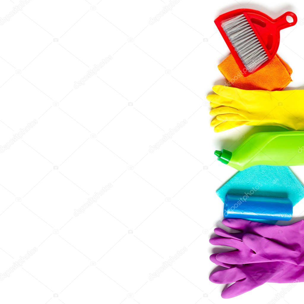 Cleaning products set of rainbow colors isolated on white background. Spring cleaning concept. Top view, copy space.