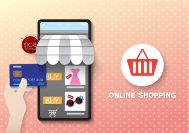 Cep telefonundan alışveriş çevrimiçi kredi kartıyla, pembe arka planlı..