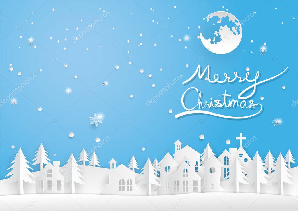 merry christmas hand writing text on blue background with the moon,city paper cut,happy new year.
