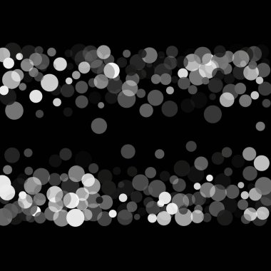  Siyah bir zemin üzerine gümüş glitter konfeti.