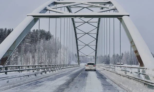 We drive in a magnificent winter landscape with icy roads and beautiful views. The road goes from Lule on the coast of Norrbotten to Jokkmokk in Swedish Lapland and on to a small lake far out in the wilderness — Stock Image Drive Magnificent Winter Landscape Icy Roads Beautiful Views Road Goes Stock Image