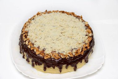 En sevdiğim lezzetli yuvarlak Pasta krema ve çikolata sosu için kendi elleriyle pişmiş