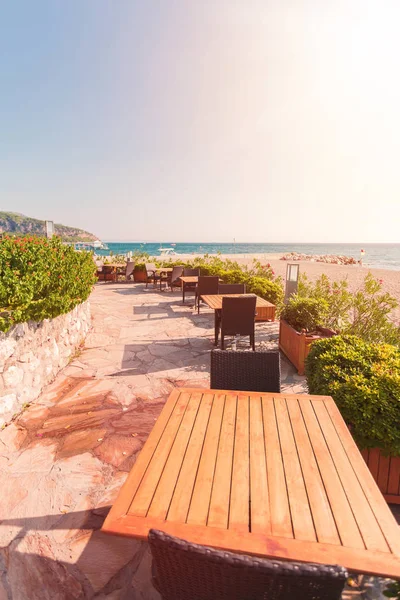 Restaurant near the sea. Terrace with tables overlooking the sea.