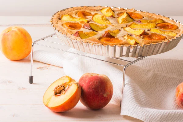 Peach pie in almond cream — Stock Photo, Image