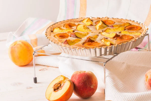 Peach pie in almond cream — Stock Photo, Image