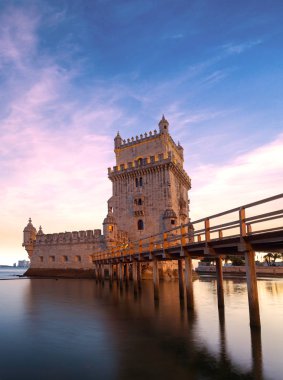 Belem tower at sunset in Lisbon, Portugal clipart
