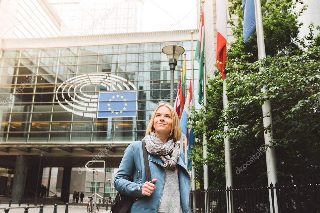 Female tourist sightseeing in Brussels, Belgium. European Parliament Building