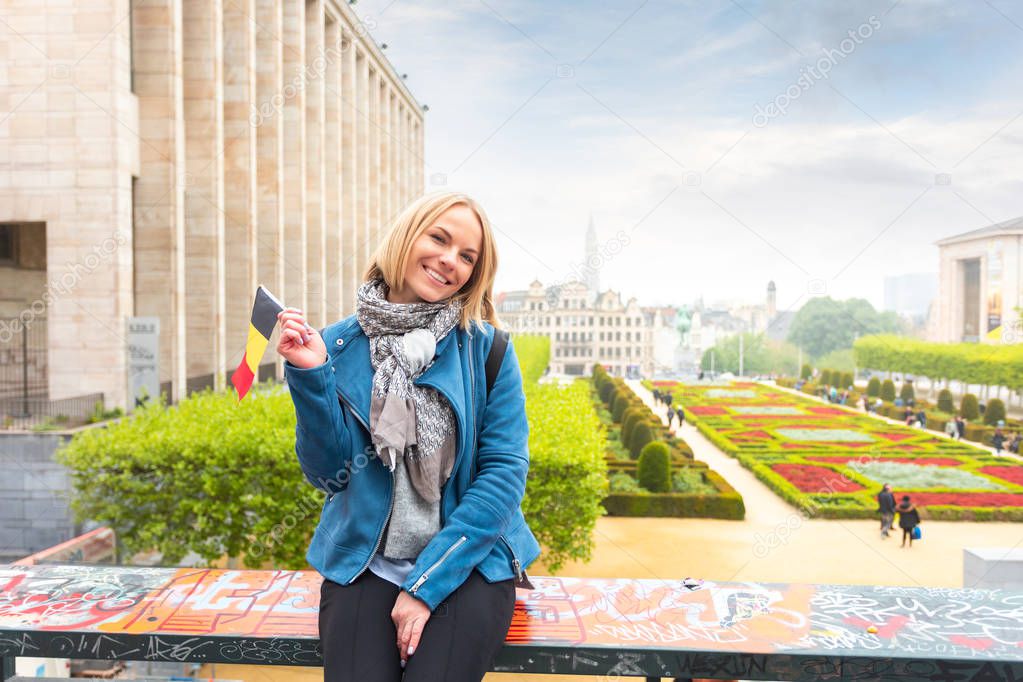 Woman traveler looks at the sights of Brussels, Belgium.