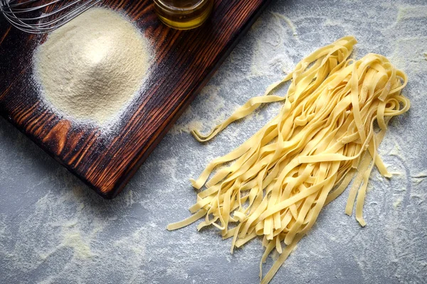 Fresh pasta on the table - tagliatelle home made — Stock Photo, Image