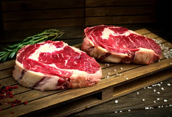 Raw rib-eye steak — Stock Photo, Image