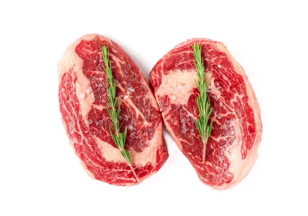 Two Raw Rib Eye Steak Marbled Beef Salt Rosemary Isolated — Stock Photo, Image