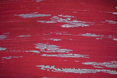 Kırmızı duvarın dokusu ve boya lekeleri.