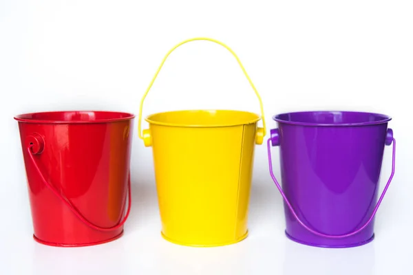 Three Metal Buckets Colored Red Yellow Purple Standing Row Solid — Stock Photo, Image