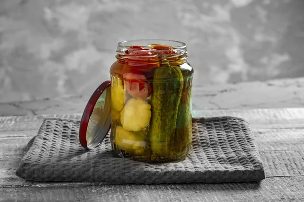 pickled vegetables in jar, copy space