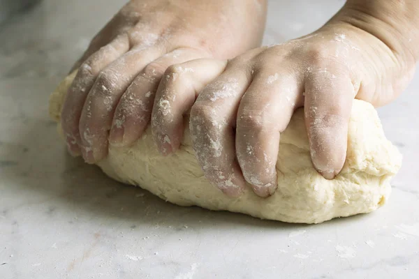 Male Baker Kneading Dough Table — Stockfoto