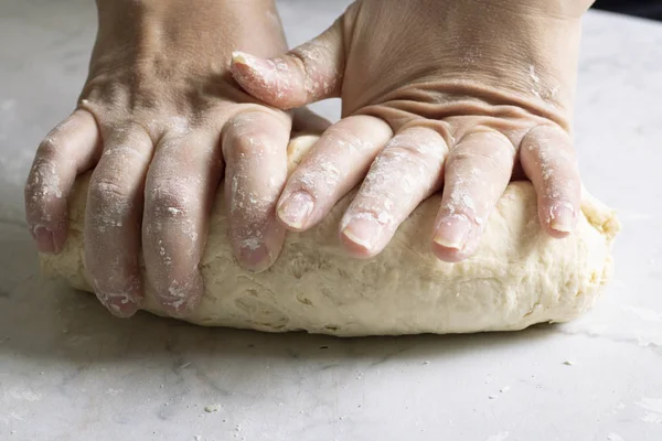 Male Baker Kneading Dough Table — Stockfoto