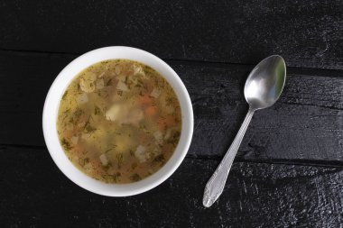 Siyah ahşap masa, üstten görünüm günü kahvaltıda vejetaryen çorbası