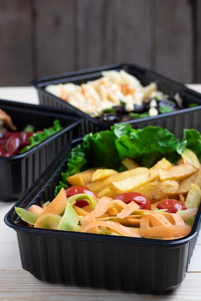 Vertical photo of three lunch boxes, red bean and vegetable salad — Stock Photo, Image