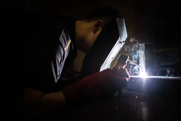welder worker at work at a metalworking company