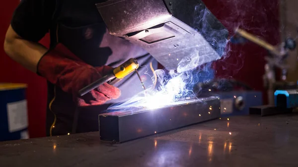 welder worker at work at a metalworking company