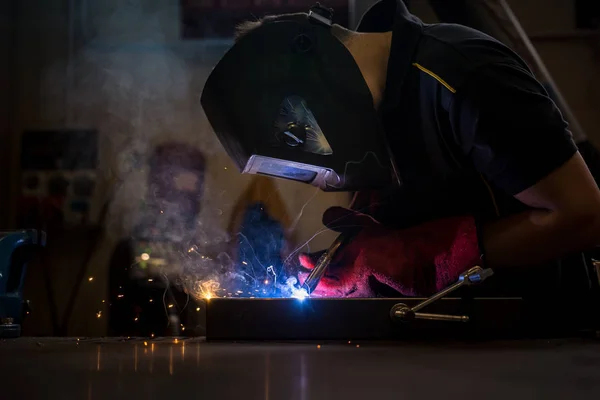 welder worker at work at a metalworking company