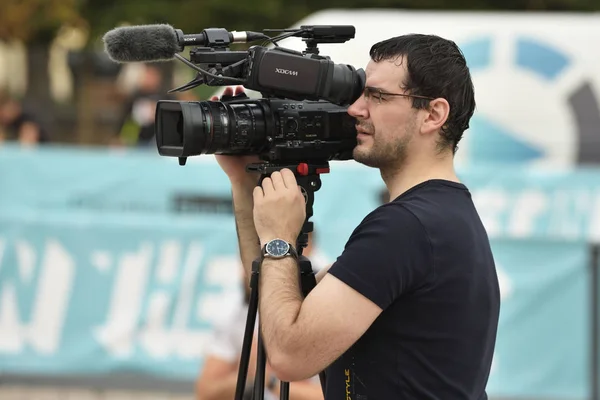 Profissional câmera de TV homem — Fotografia de Stock