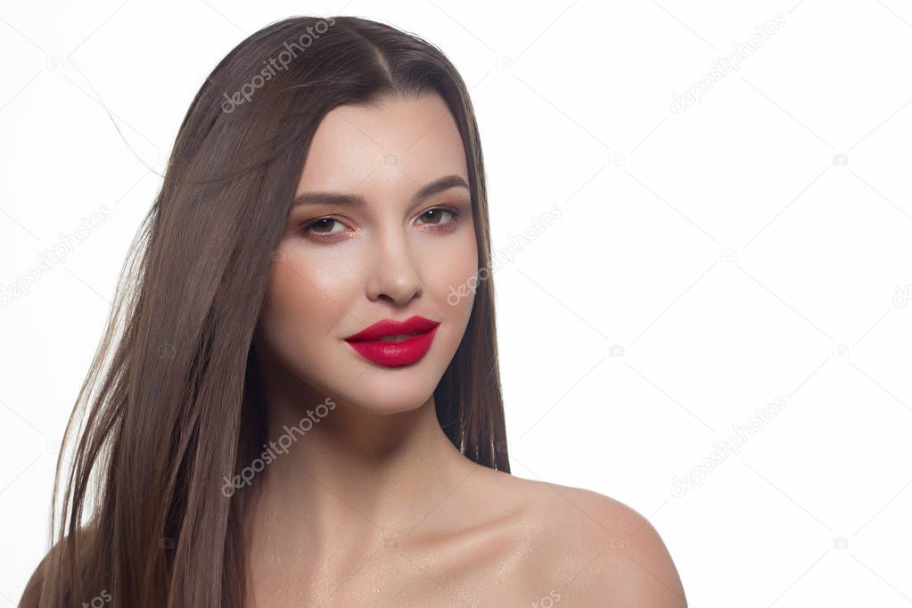Close-up portrait of sexy european young woman model with classic glamour make-up and marsala lipstick. Dark long hairstyle, christmas makeup, dark eyeshadows, bloody pink lips with gloss