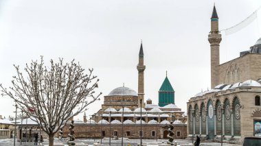 KONYA, TURKEY - 24 DECEMBER 2017: View of Mevlana Museum with snow view, December 24, 2017 in Konya, Turkey. The anniversary of Mevlana's death is celebrated for 744 years with 'Seb-i Aruz'. 