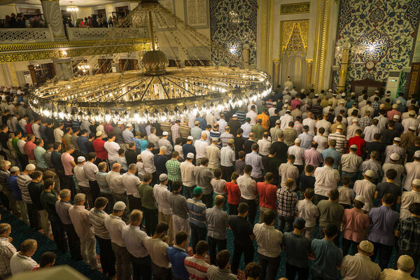 ISTANBUL, TURKEY - AUGUST 03: Tarawih prayers in Ramadan for Muslims Tunahan Mosque on August 3, 2013 in Istanbul, Turkey. Tunahan mosque, is a big mosque was opened for worship in 2004.