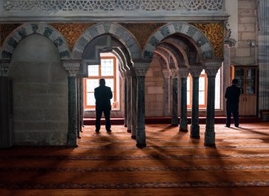Muslims praying in mosque clipart