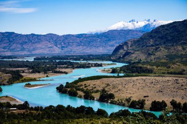 contrasts of the landscape with the river baker. Austral road. Patagonia. region of aysen. Chile clipart