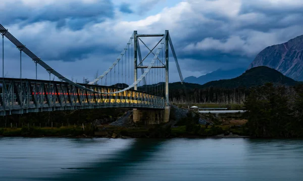 suspension bridge over the mayer river. Patagonia. Austral road. Region of Aysen. Chile