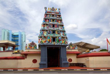 The Hindu Temple Of Sri Mariamman . Sri Mariamman temple is located in the center of the old Chinatown. The building was built in 1843 by Madras masters, but later the temple was repeatedly completed and decorated until the 60s of the twentieth centu clipart