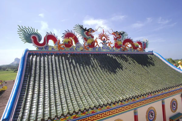 Pattaya. Thailand. Chinese temple of Viharn Sien. Roof. The temple was built in pure Chinese style. The uniqueness of the temple is that in fact it is a Museum dedicated to Thai and Chinese history and culture, and it contains a large number of ancie