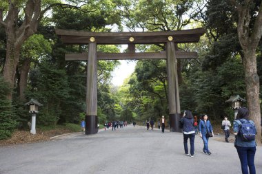 Tokyo, Japan, 04/20/2017, the Main gate to Yoyogi Park and Meiji Jingu Shrine. Yoyogi Park is one of the largest parks in Tokyo, located close to the Meiji Shrine. Meiji Jingu is the largest Shinto Shrine in Tokyo dedicated to the Emperor Meiji, his  clipart