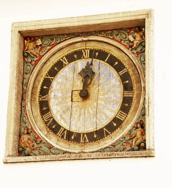 Tallinn. Estonia. Old clock on the wall of the Church of the Holy spirit. The oldest clock in Tallinn. They are located on the wall of the Church of the Holy spirit of the 14th century and made of wood. The clock looks at the main street of old Talli