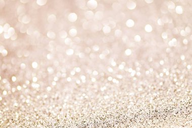 bej şampanya beyaz parlak Noel ışıkları. Bulanık arka plan