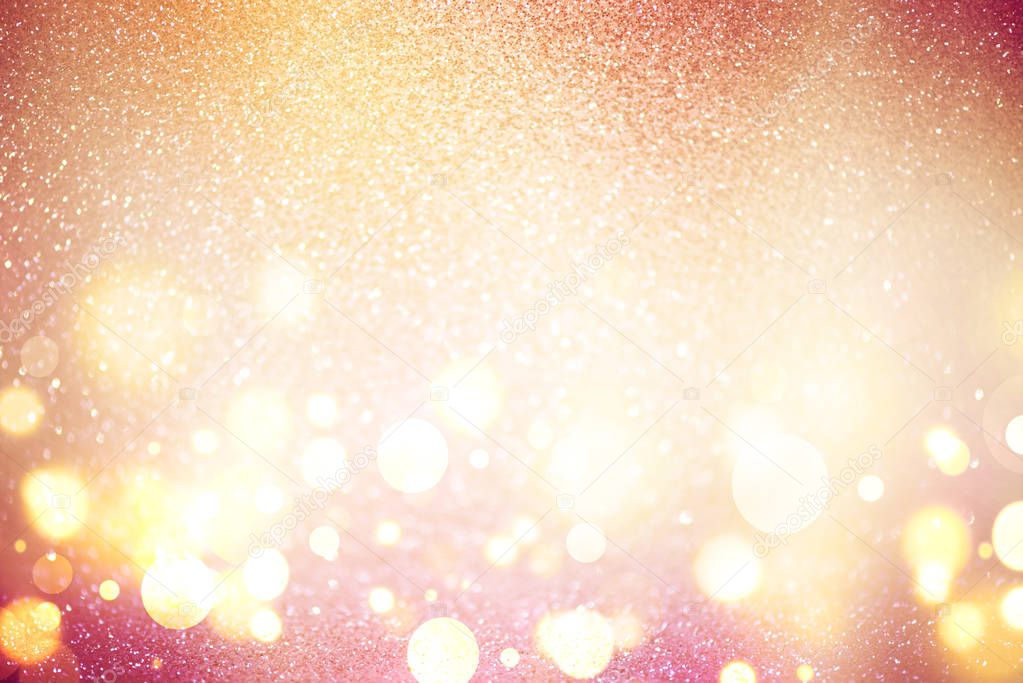 abstract defocused lights, sparkling holiday bokeh background with golden tones, elegant christmas backdrop