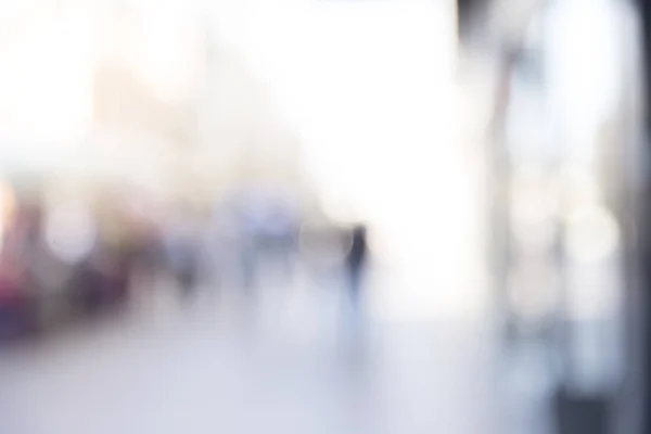 Onscherpe Achtergrond Wazig Mensen Lopen Door Een Straat Stad — Stockfoto