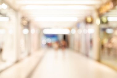 Mağaza bokeh arka plan bulanıklık. Siluetleri bulanık hareket yürüyüş iş adamları. Office koridorda yürürken iş adamları.