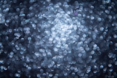 Soyut odandan çıkarılmış ışıklar, ışıl ışıl tatil arka planı, altın tonlarıyla, zarif Noel arkaplanı.