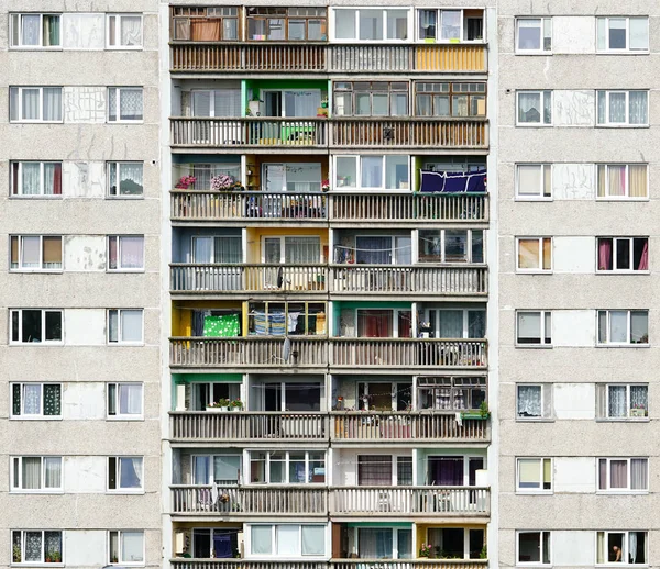 poor suburban block of soviet flats, construction, balcony