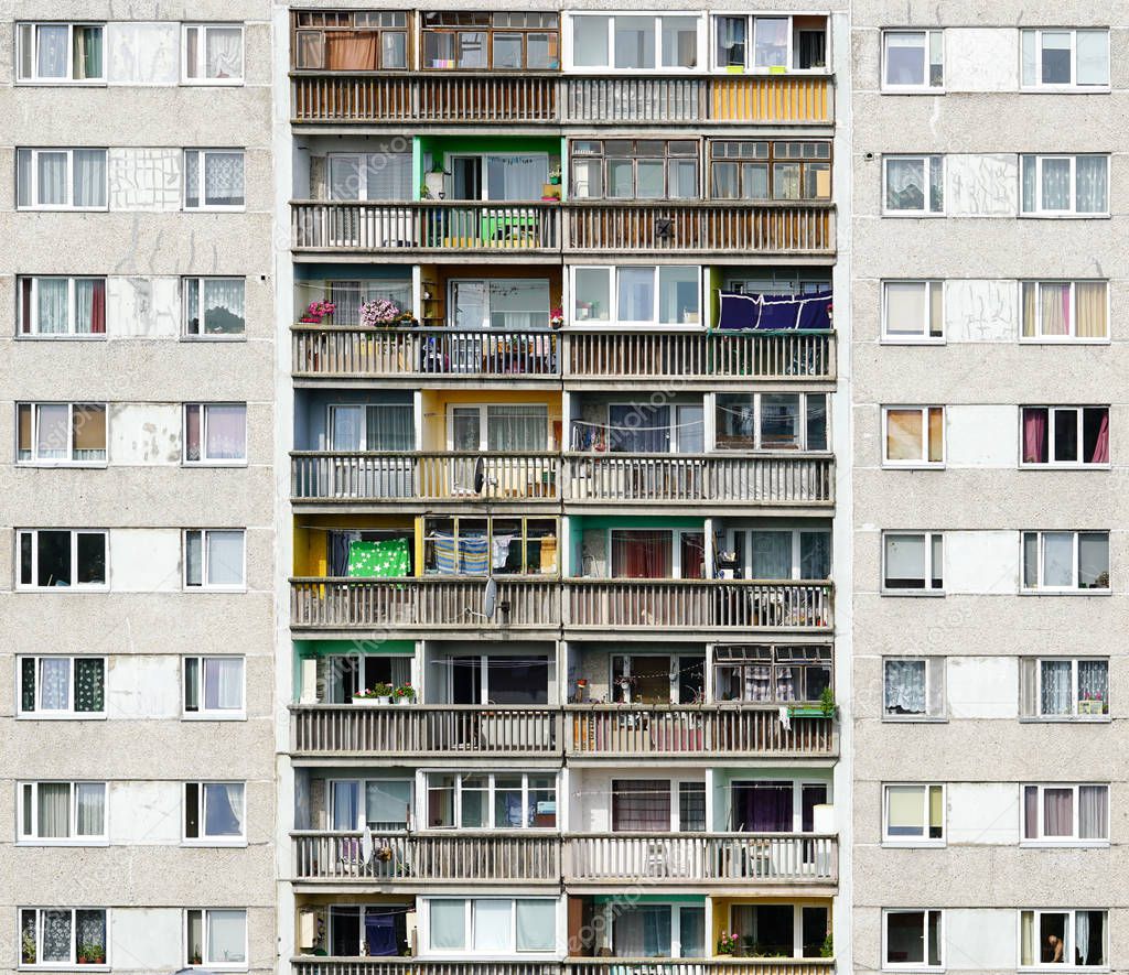 poor suburban block of soviet flats, construction, balcony