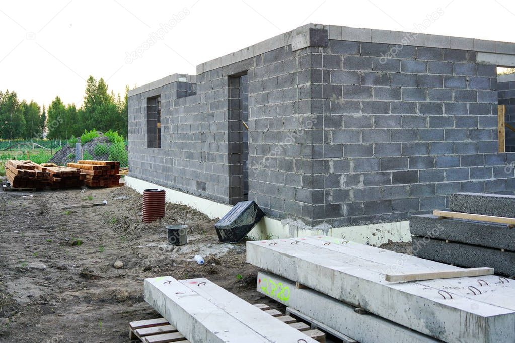 Concrete foundation of a new house, wall construction
