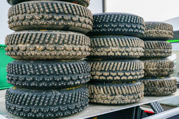 Group of studded snow tires for rally for use in winter rally stages — Stock Photo, Image